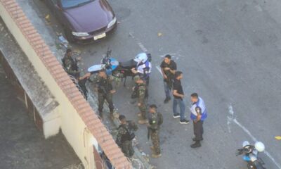 Agentes do Segurança Presente e militares durante prisão após roubo a estudante no Maracanã
