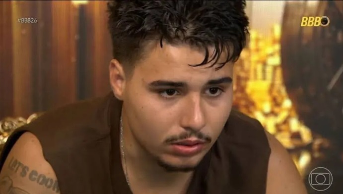 Cena do BBB 26 com participantes em discussão após polêmica